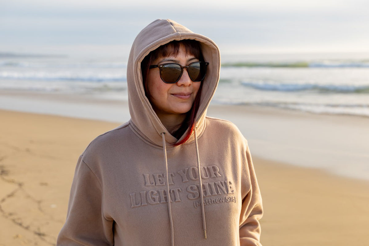 Let Your Light Shine: The Meaning Behind Our Message Hoodies